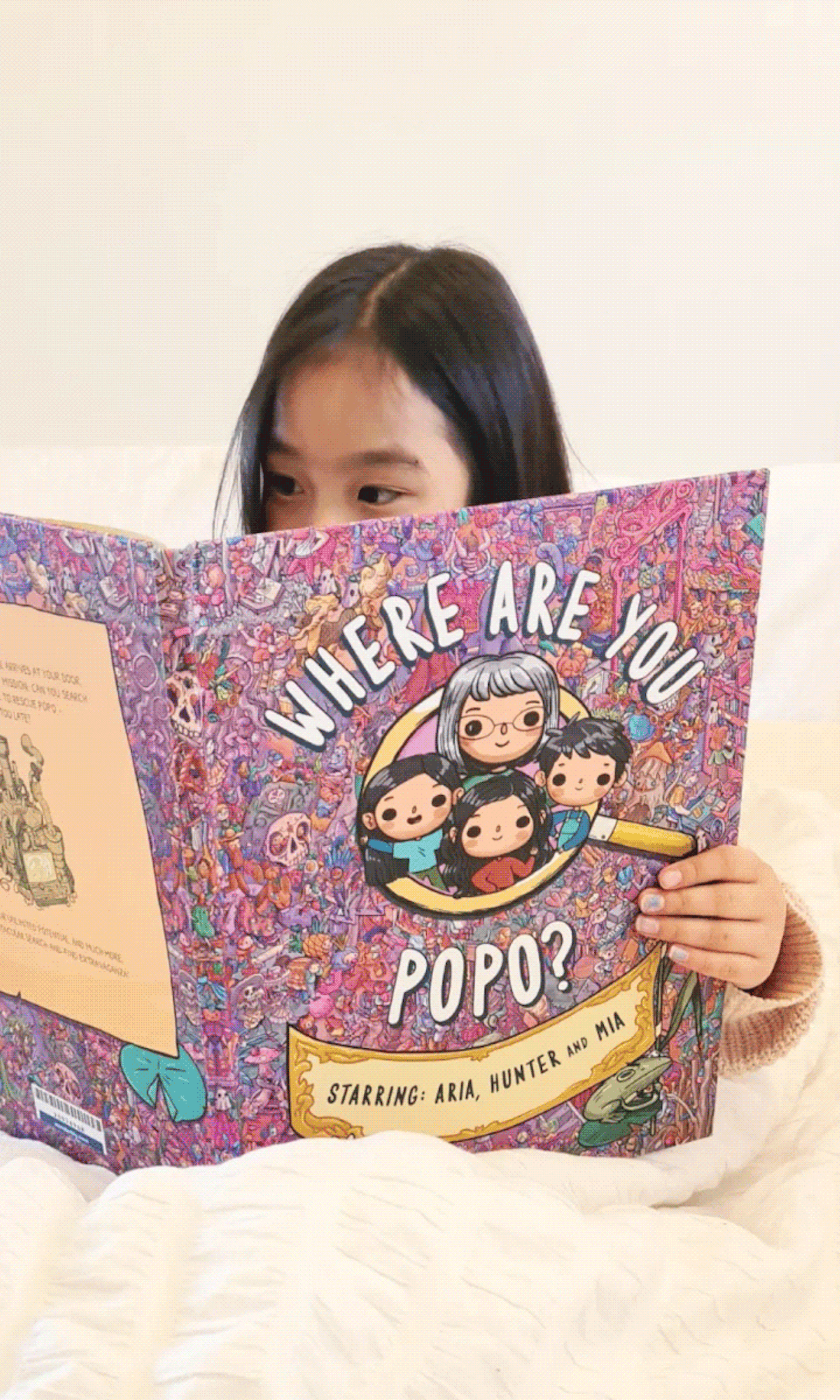 Families, kids, and adults posing with their Bramble Books books